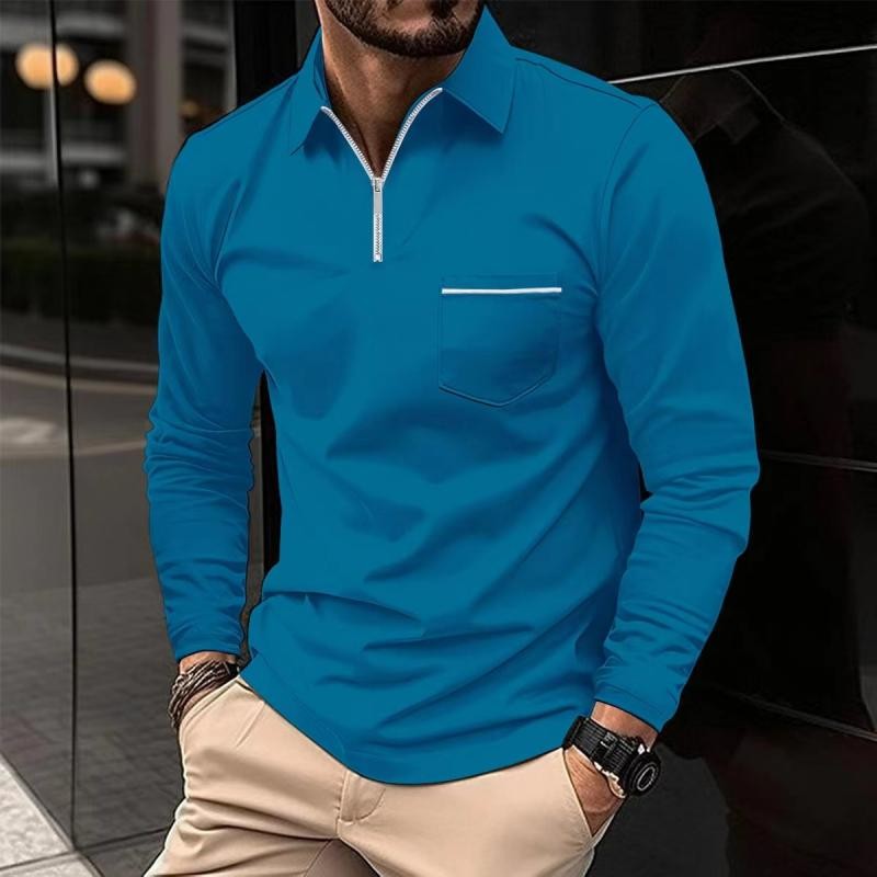 Teal blue polo shirt with quarter-zip collar and contrast pocket stripe