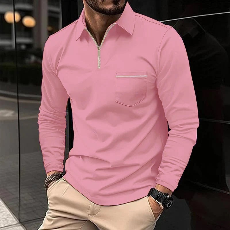 Pink long sleeve polo shirt with zip-up collar and pocket detail